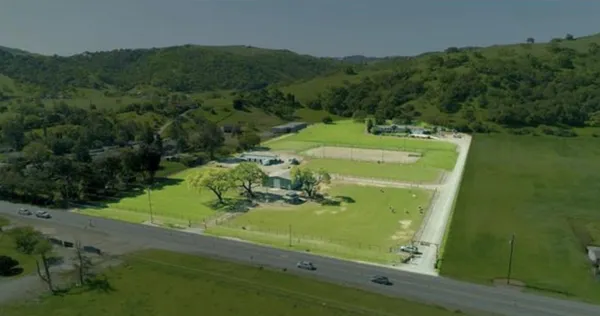a view of a fountain in a yard