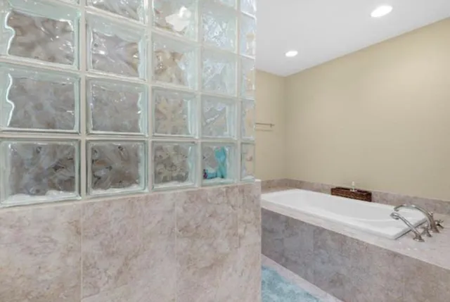 a bathroom with a bathtub