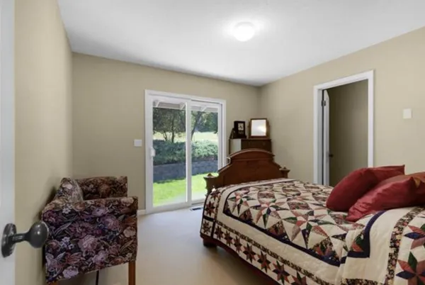 a bathroom with a granite countertop sink a toilet and bathtub
