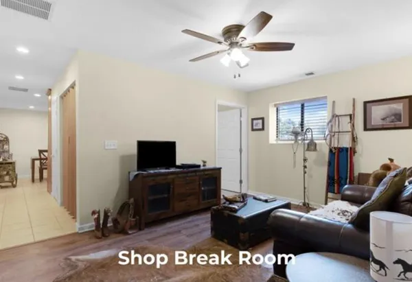 a view of a street with sitting area