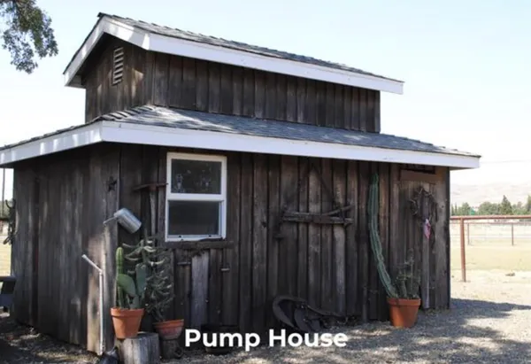 a view of a lake with couches in the roof
