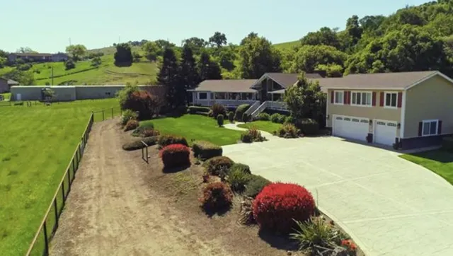 a view of a balcony with chairs