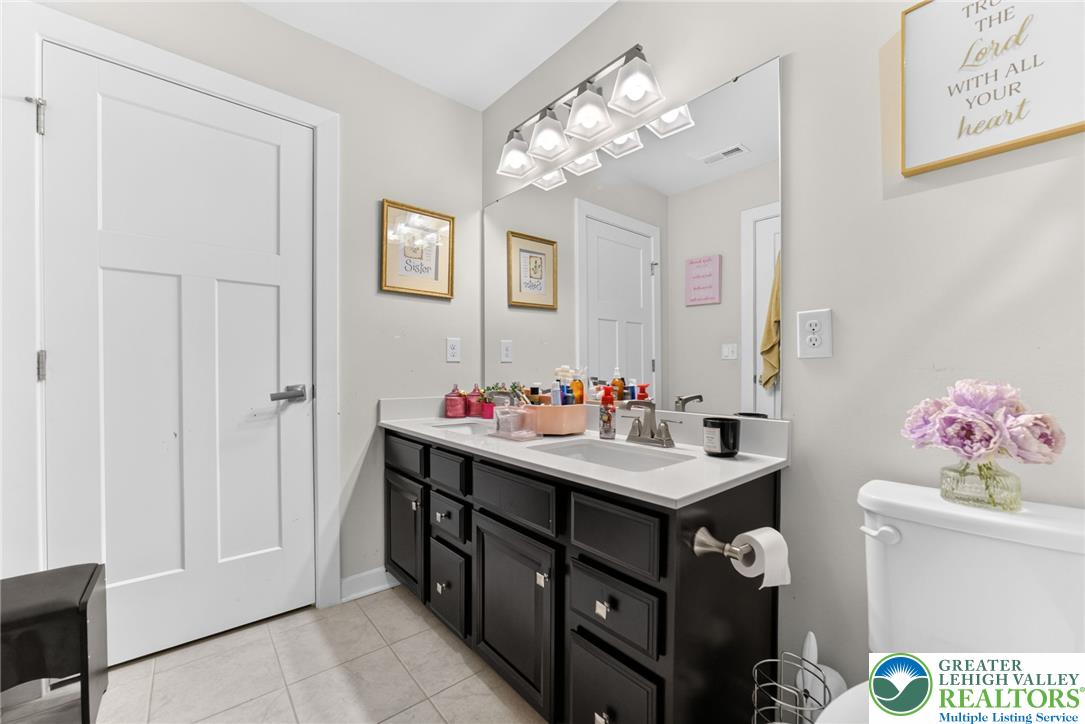 3952 Orth Street Bethlehem, PA 18020 - Photo 35 of 60 Double vanity in this bathroom provides convenience and ample storage.