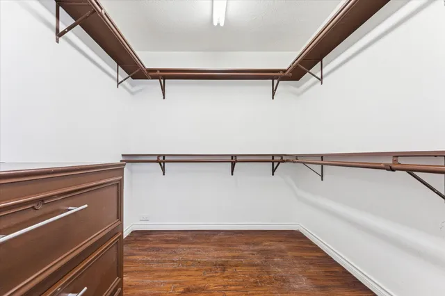 a view of a room with racks on the wall