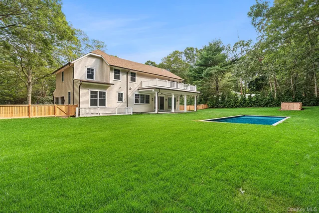 a view of a house with a big yard