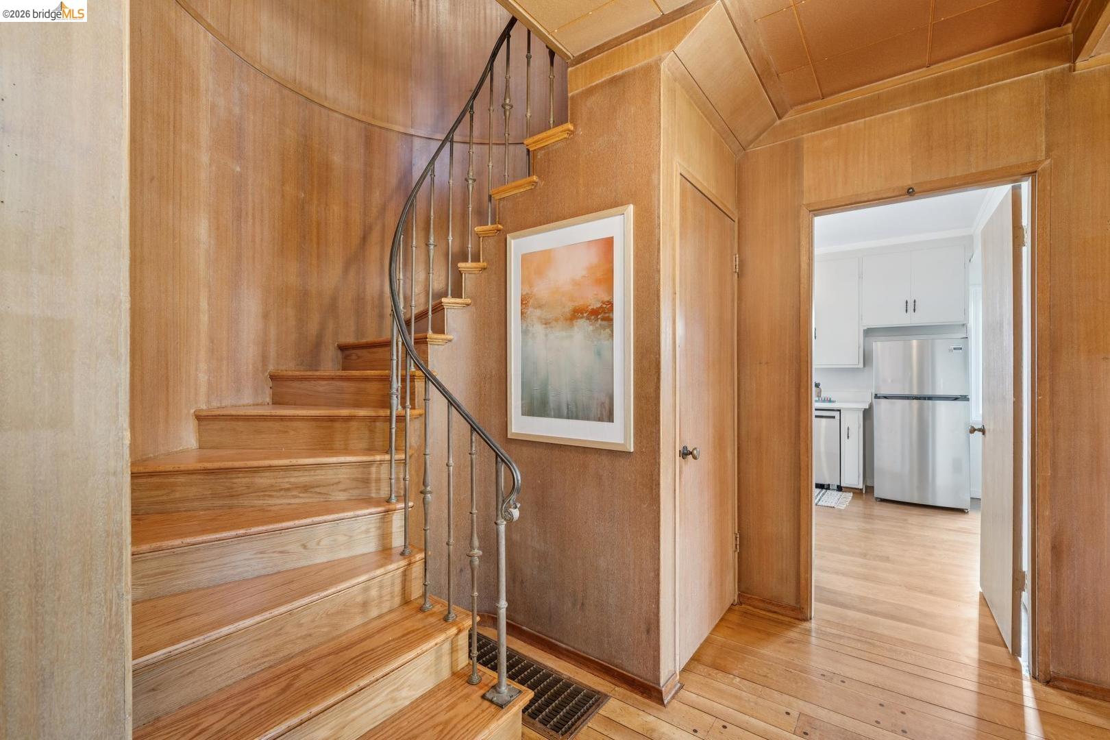 155 Avenida Drive Berkeley, CA 94708 - Photo 32 of 86 Curved staircase with wood-finish treads and metal balusters
