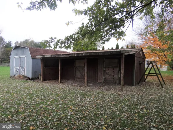 a house with trees in the background