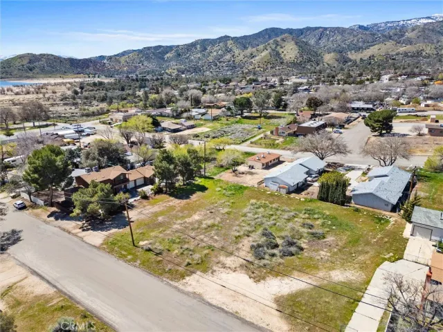 a view of a city with mountains in the background