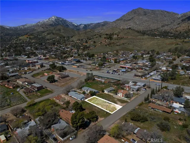 an aerial view of residential house with parking space