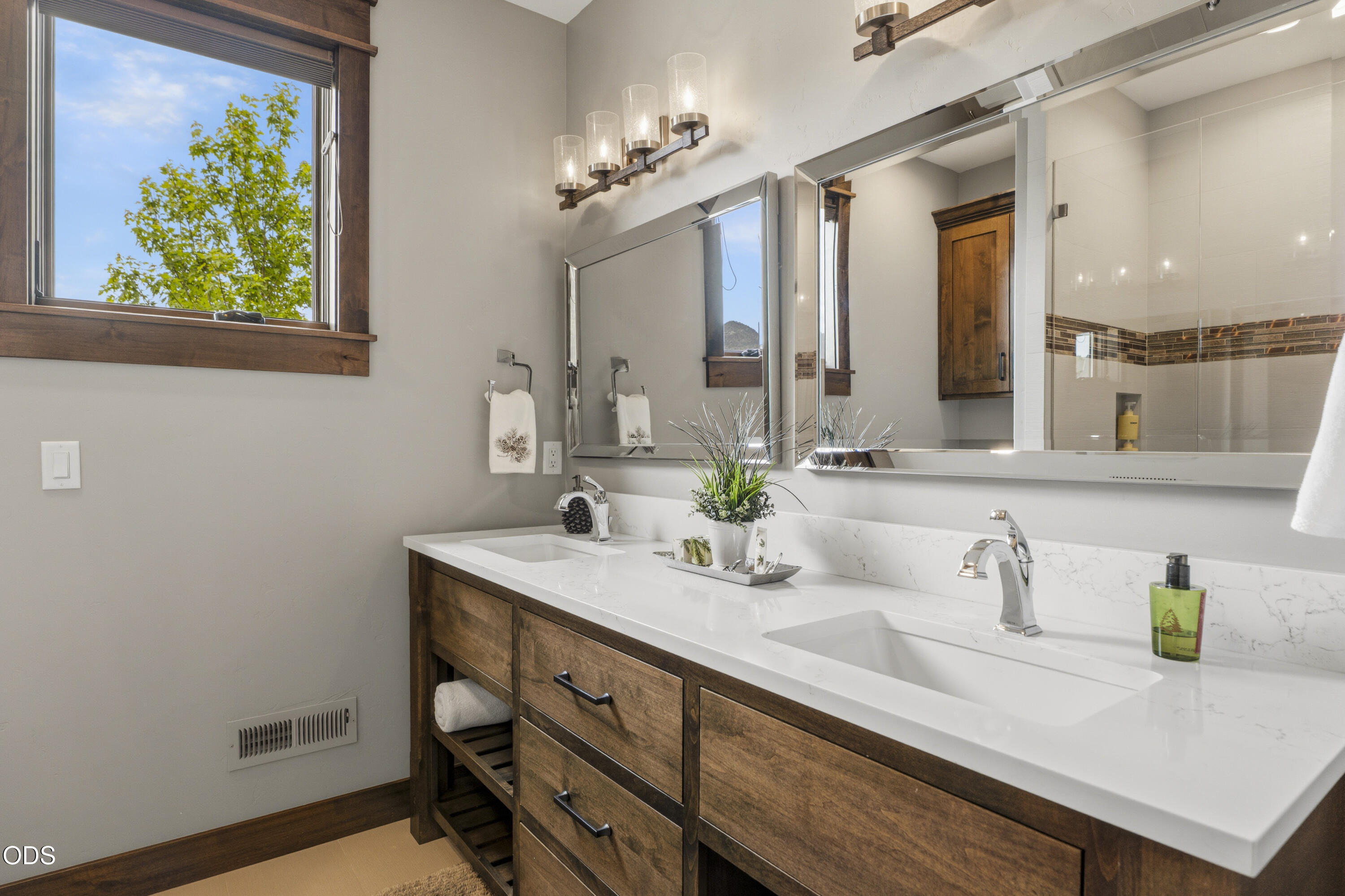 15935 South W Brasada Ranch Road Powell Butte, OR 97753 - Photo 28 of 45 a bathroom with a sink and a mirror