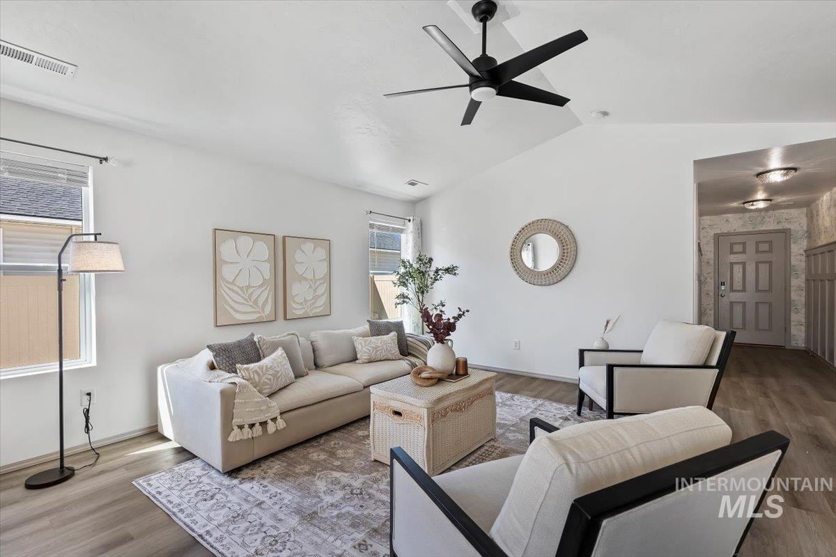 12781 Ashfield Street Caldwell, ID 83607 - Photo 4 of 30 Living room with wood finished floors and a ceiling fan