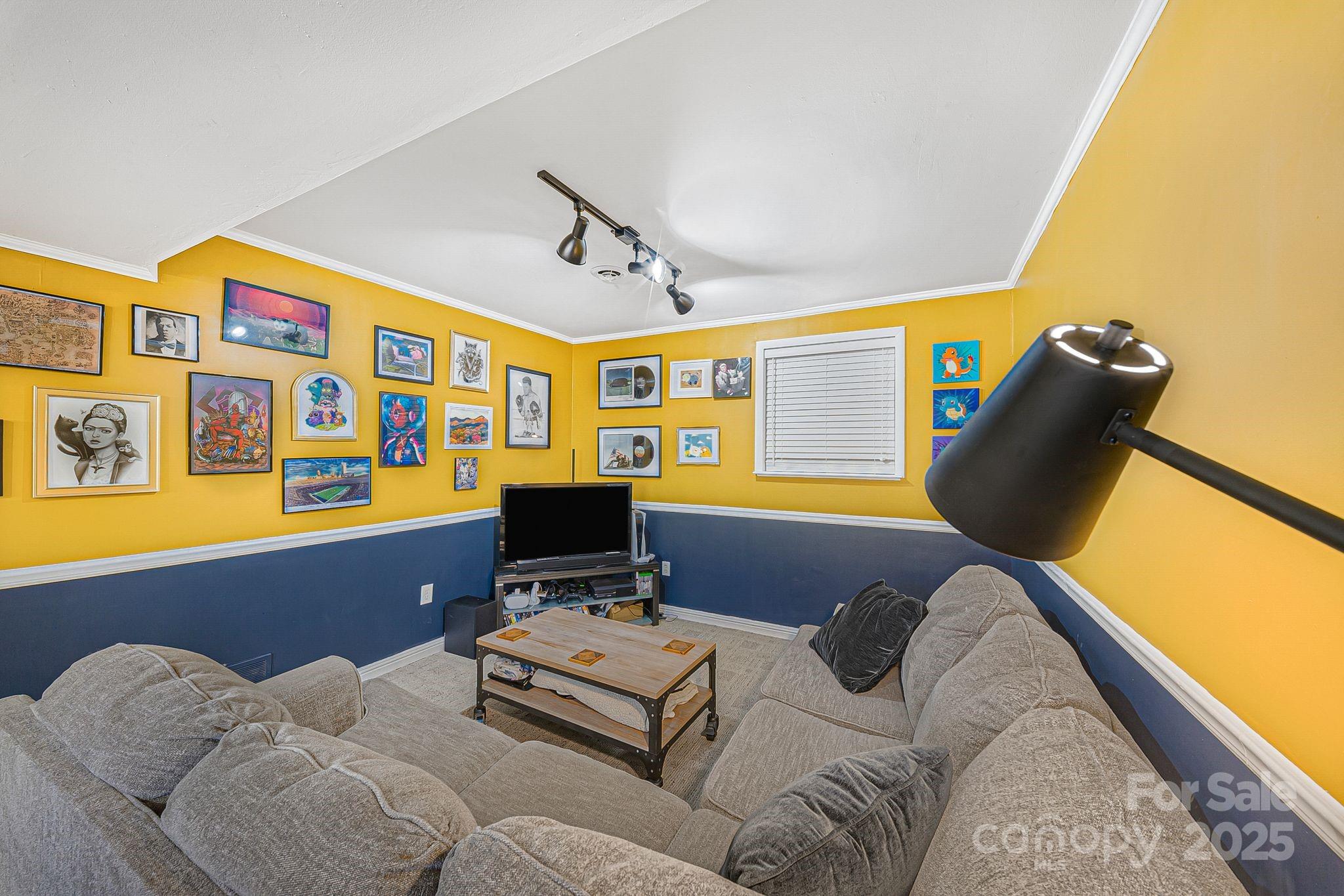 16 Woodfield Road Arden, NC 28704 - Photo 24 of 41 a bedroom with furniture and a window