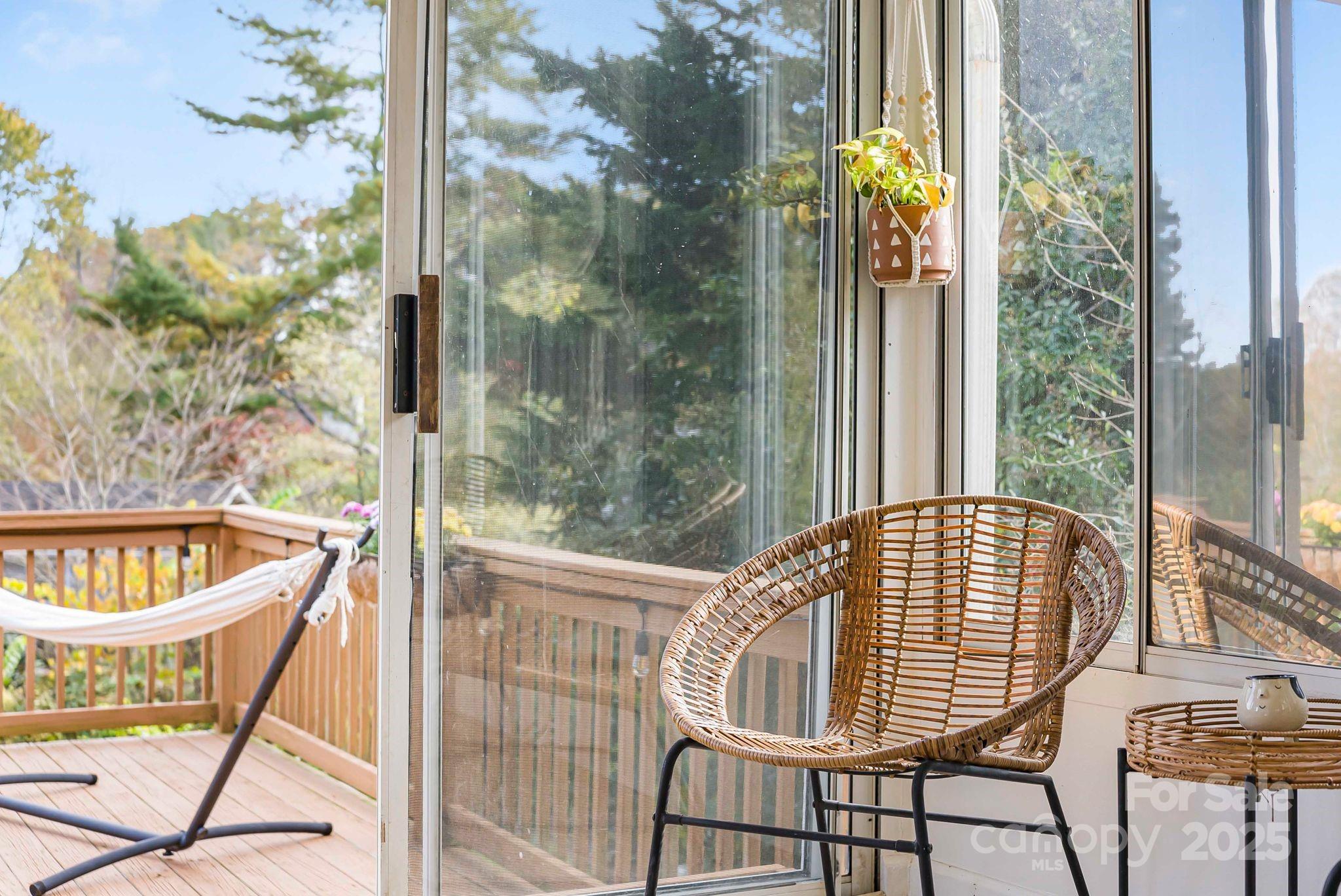 16 Woodfield Road Arden, NC 28704 - Photo 28 of 41 a view of a balcony with chair and table