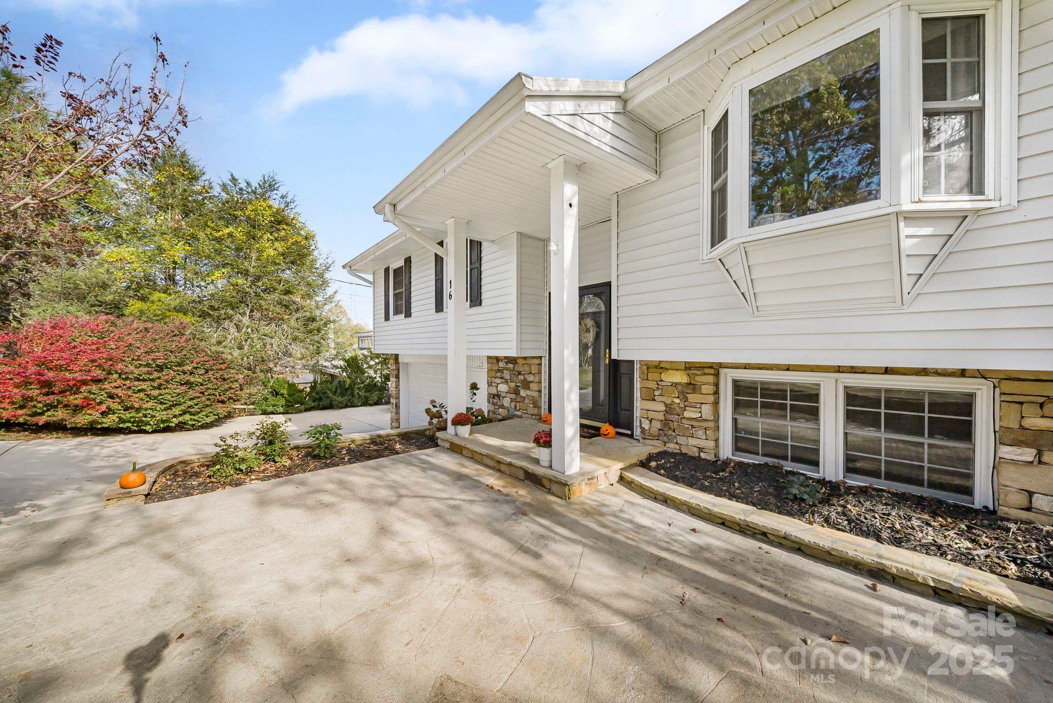 16 Woodfield Road Arden, NC 28704 - Photo 38 of 41 a view of a house with a snow in front of it