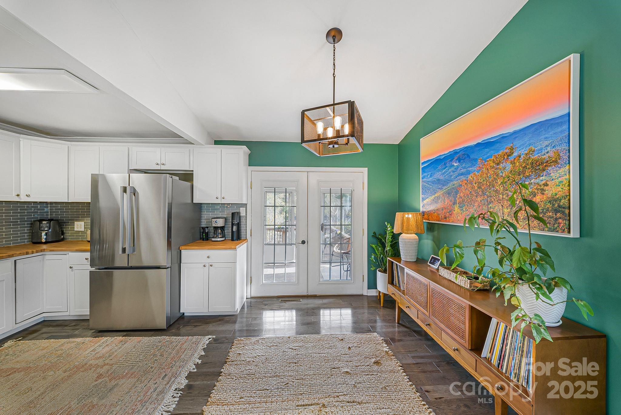 16 Woodfield Road Arden, NC 28704 - Photo 8 of 41 a kitchen with stainless steel appliances granite countertop a refrigerator and a stove