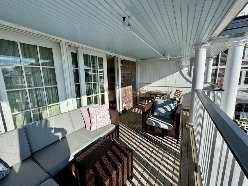 38 North Water Street, Unit R2 Edgartown, MA 02539 - Photo 15 of 38 Sunny outside spaces with sea breeze and a peek of nearby Edgartown Harbor. and sea breezes
