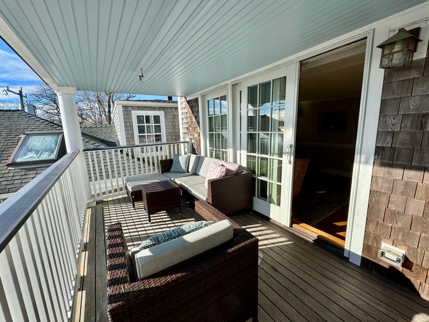 38 North Water Street, Unit R2 Edgartown, MA 02539 - Photo 16 of 38 Private deck offers al fresco dining and lounge area with sliders to living room