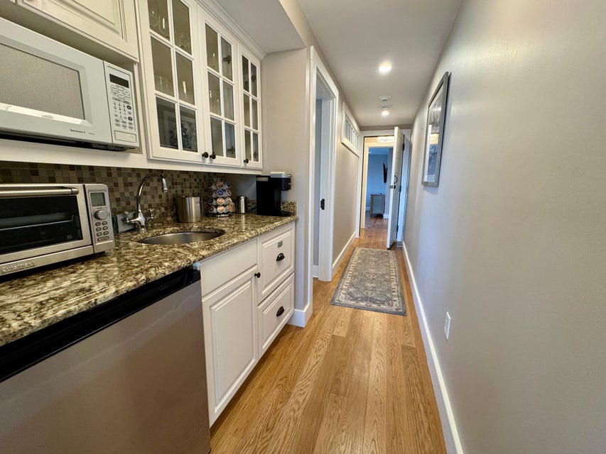 38 North Water Street, Unit R2 Edgartown, MA 02539 - Photo 18 of 38 Kitchenette features granite countertops and stainless steel appliances.