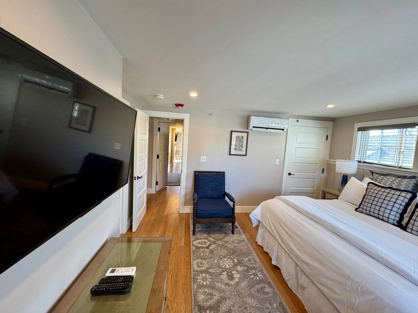 38 North Water Street, Unit R2 Edgartown, MA 02539 - Photo 35 of 38 Wide-screen television and step-in closet.
