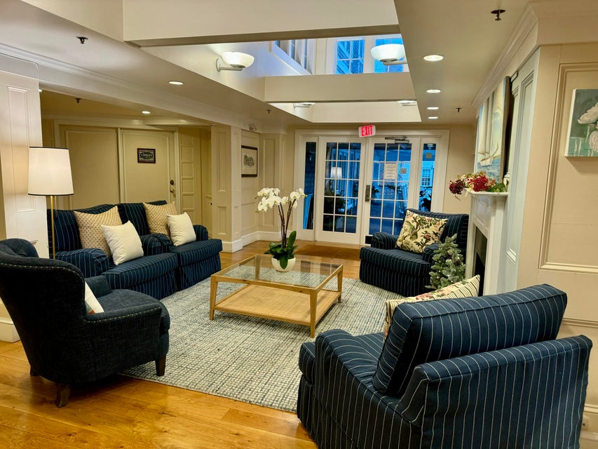 38 North Water Street, Unit R2 Edgartown, MA 02539 - Photo 4 of 38 Lobby area opens onto the front porch with wooden rockers to enjoy the activity of historic Edgartown Village.