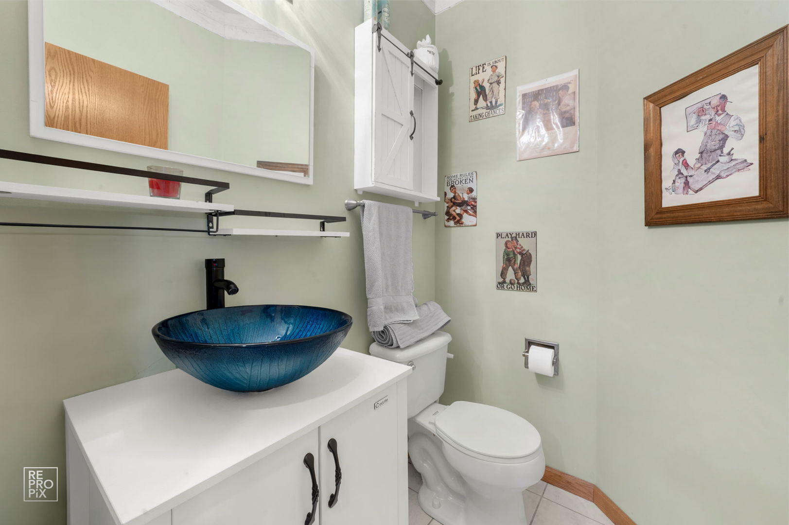 29 Bay Drive Itasca, IL 60143 - Photo 12 of 28 a bathroom with a toilet a sink and a mirror