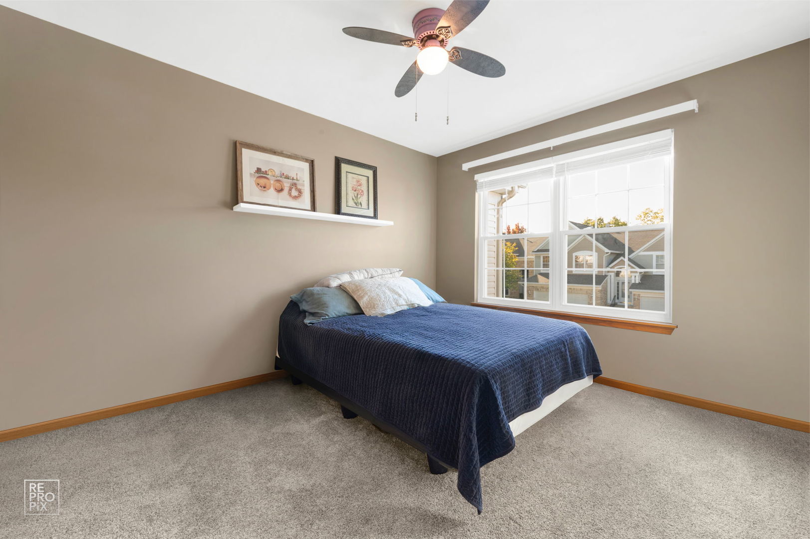 29 Bay Drive Itasca, IL 60143 - Photo 21 of 28 a bedroom with a bed and a window