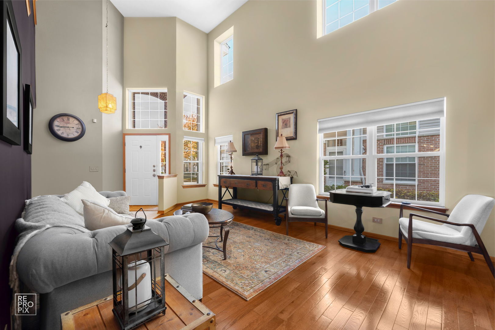 29 Bay Drive Itasca, IL 60143 - Photo 3 of 28 a living room with furniture floor to ceiling window and wooden floor