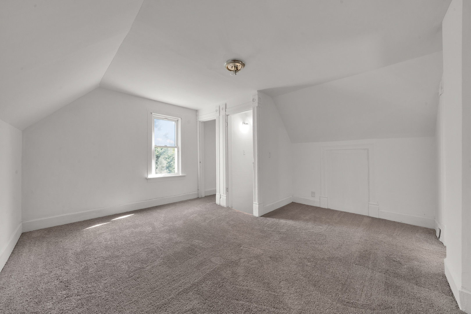 11548 South State Street Chicago, IL 60628 - Photo 14 of 22 an empty room with windows