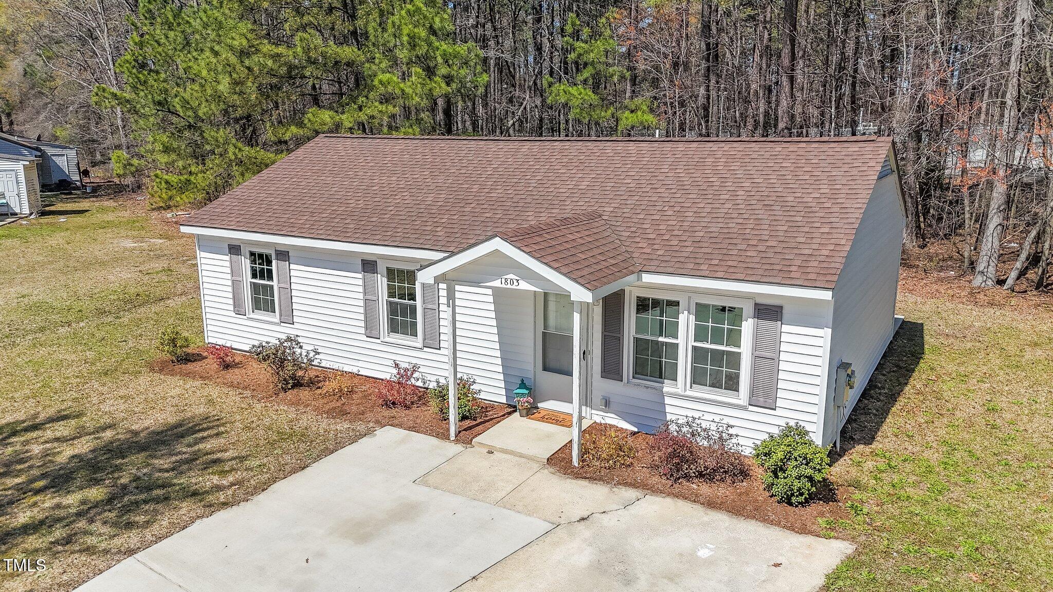 1803 Ruffleleaf Circle Wilson, NC 27893 - Photo 1 of 49 38-web-or-mls-DJI_20250327142525_0109_D