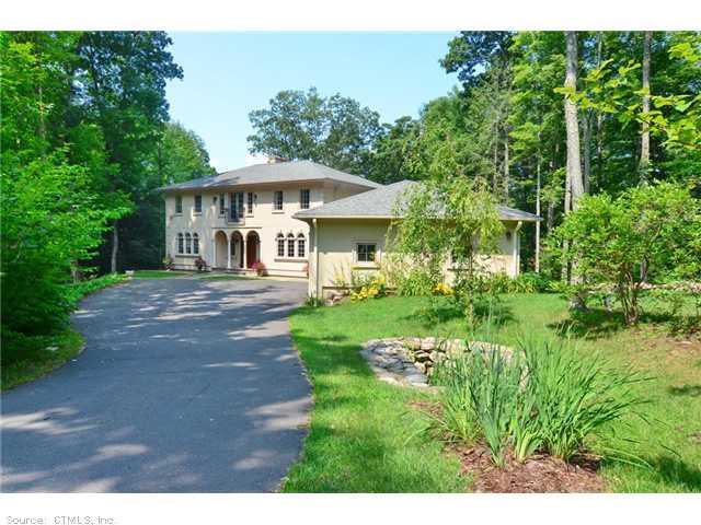 24 Thronebrook Road Granby, CT 06090 - Photo 1 of 1 a front view of a house with a yard
