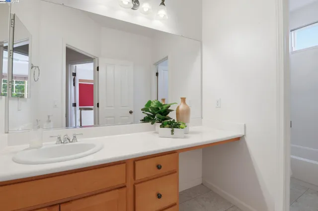a view of a swimming pool with a table and chairs