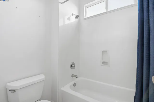 a view of a patio with swimming pool table and chairs