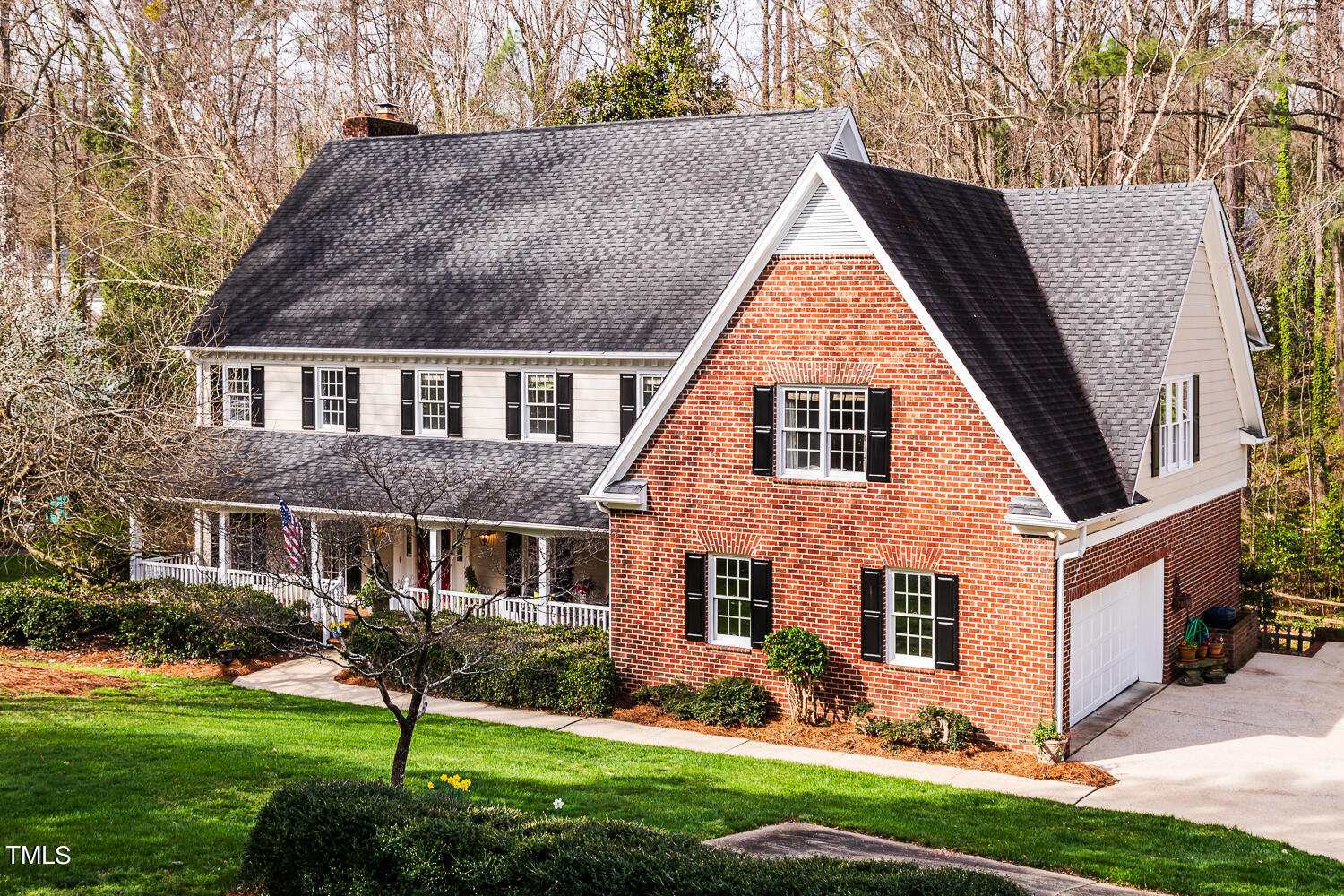 6917 Slade Hill Road Raleigh, NC 27615 - Photo 1 of 1 a front view of house with yard and green space