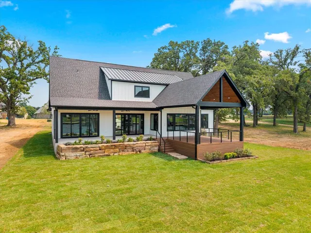 a front view of a house with swimming pool