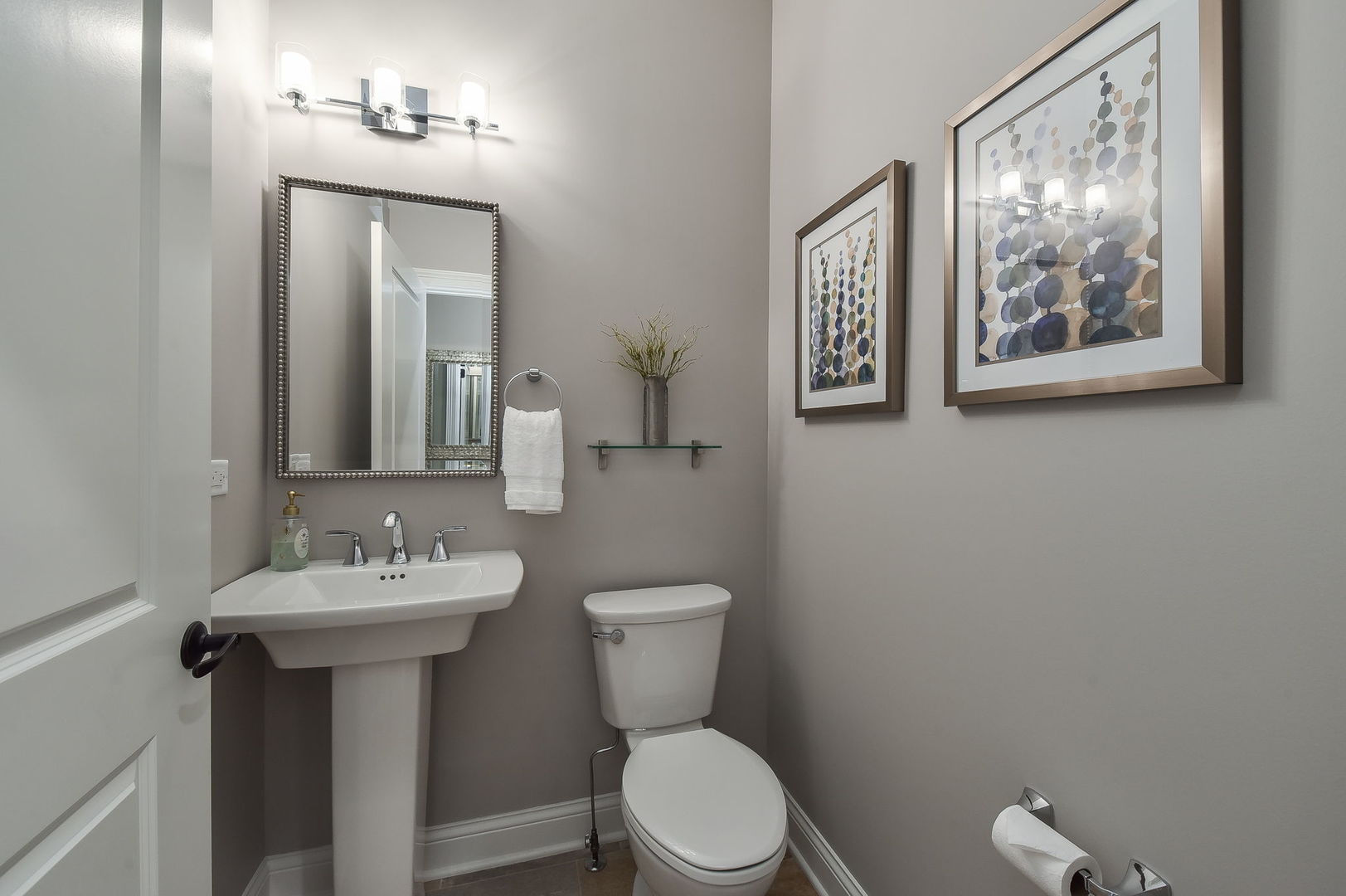 436 East Hillside Road Naperville, IL 60540 - Photo 22 of 59 a bathroom with a toilet a sink and mirror