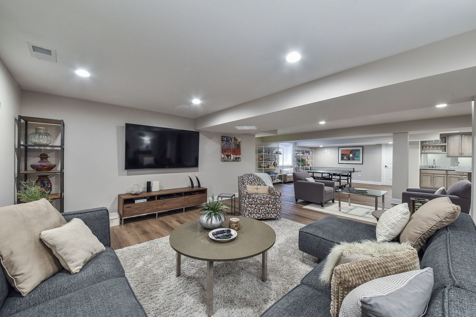 436 East Hillside Road Naperville, IL 60540 - Photo 36 of 59 a living room with furniture and a flat screen tv