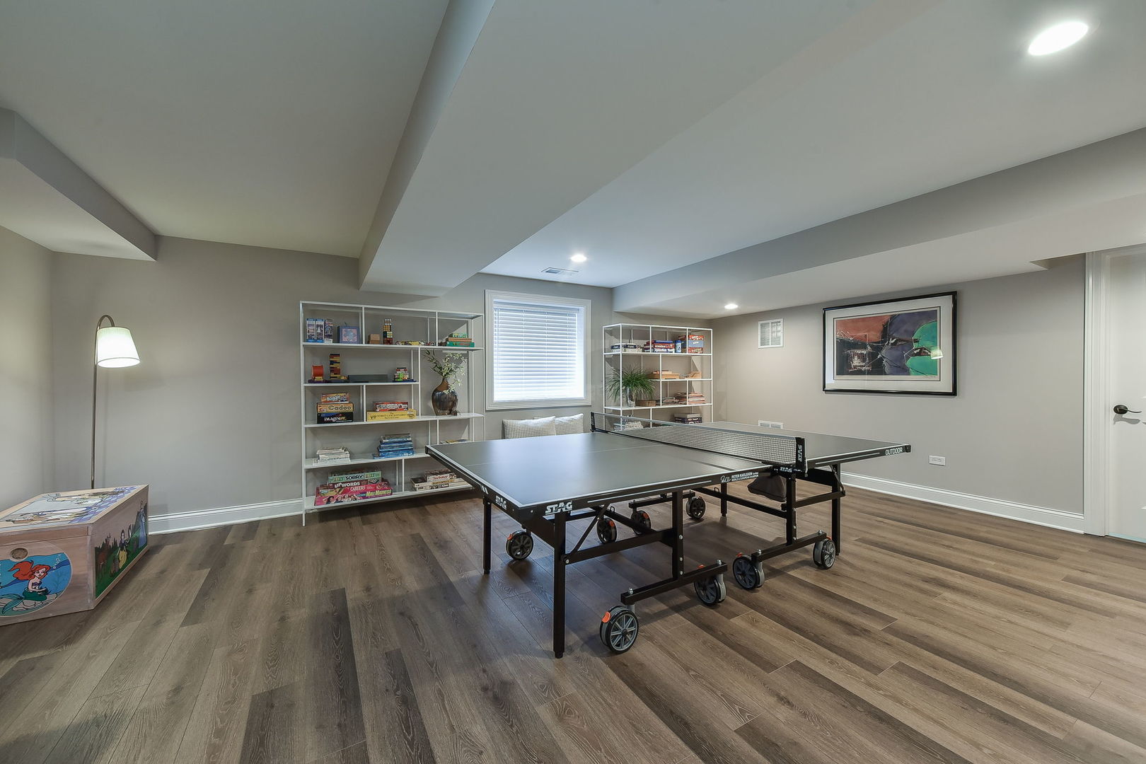 436 East Hillside Road Naperville, IL 60540 - Photo 39 of 59 a room with wooden floor and furniture