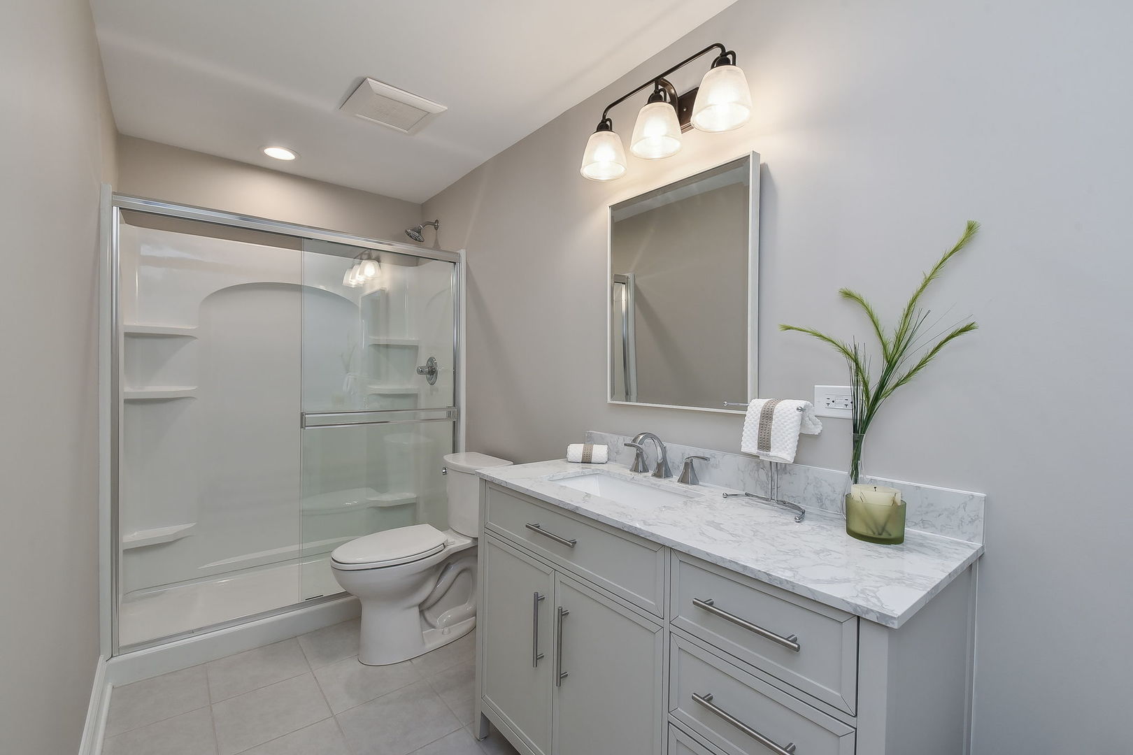 436 East Hillside Road Naperville, IL 60540 - Photo 41 of 59 a bathroom with a granite countertop sink a toilet and shower