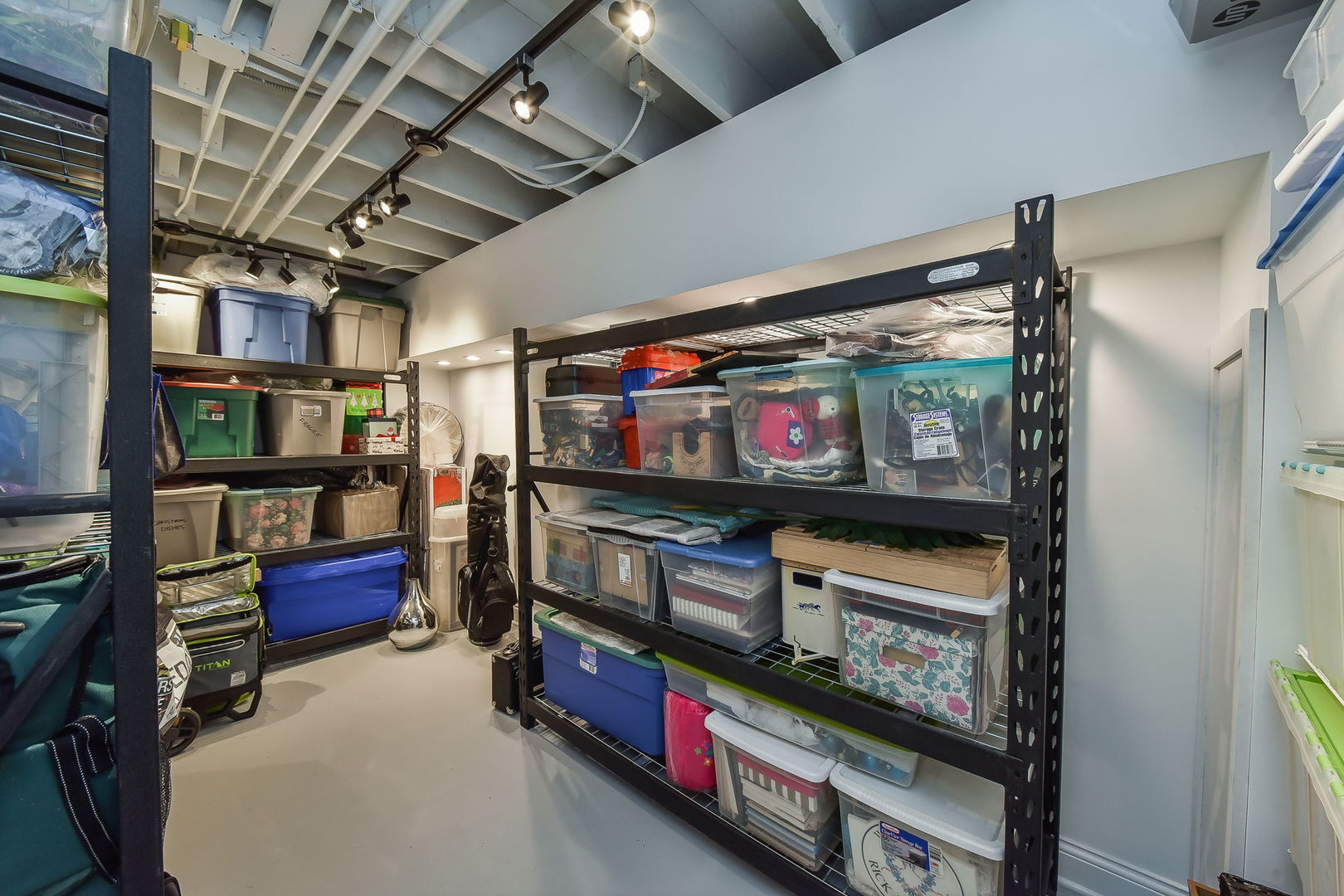 436 East Hillside Road Naperville, IL 60540 - Photo 43 of 59 a area with furniture and a flat screen tv