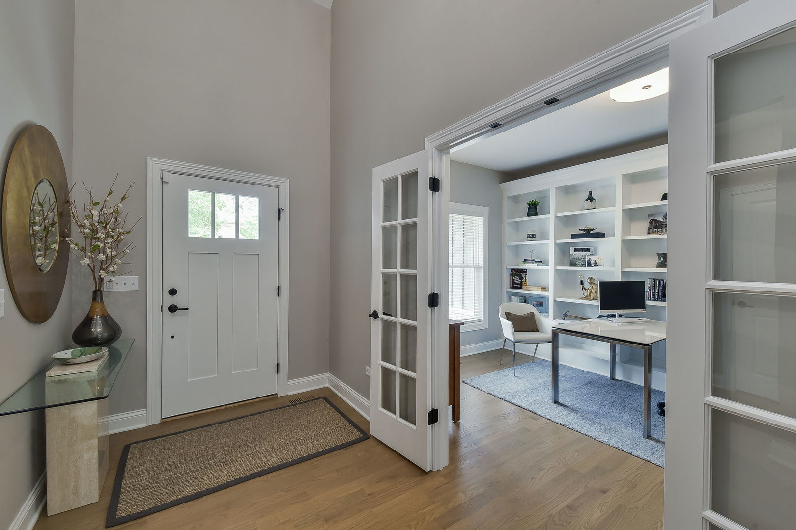 436 East Hillside Road Naperville, IL 60540 - Photo 8 of 59 a living room with furniture a rug and white walls