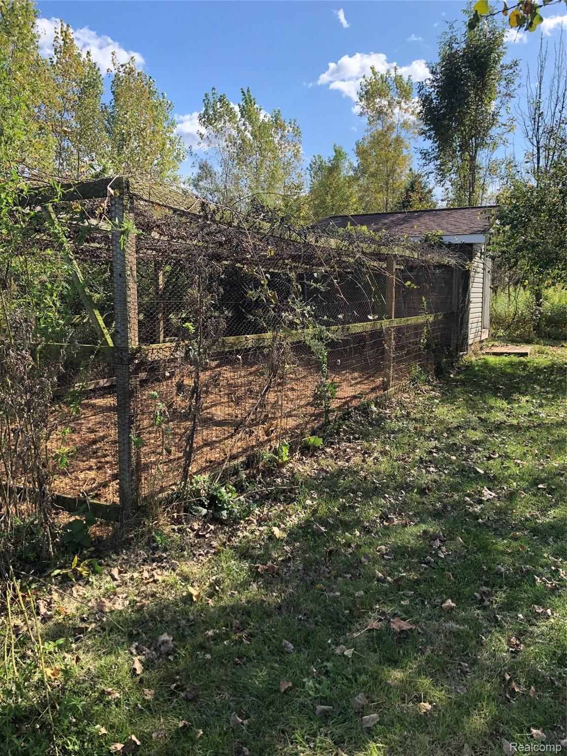 3779 South Bull Run Road Gregory, MI 48137 - Photo 30 of 35 Chicken run fenced in!