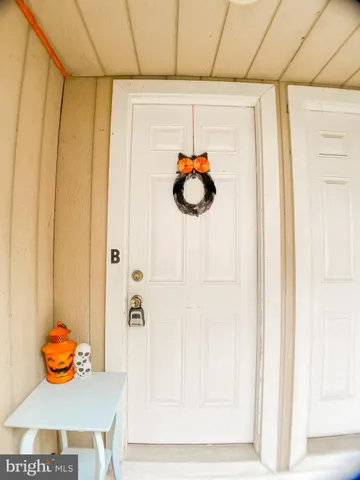 a bathroom with a sink and a shower curtain