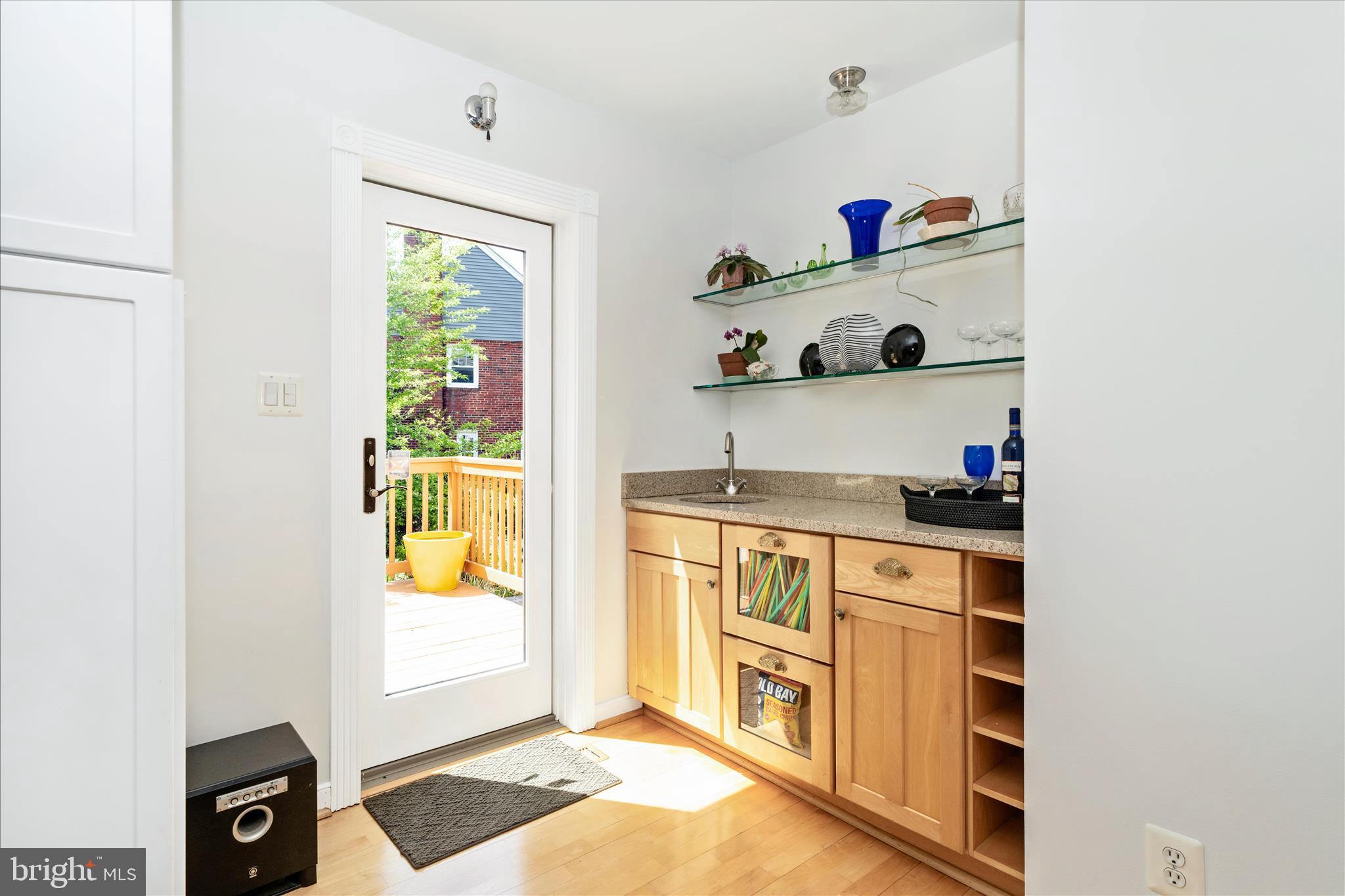 9300 Mintwood Street Silver Spring, MD 20901 - Photo 19 of 115 a kitchen with stainless steel appliances granite countertop a sink and a window