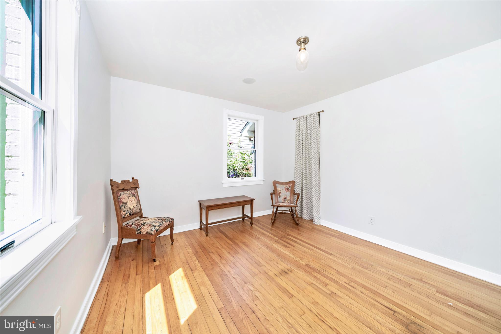 9300 Mintwood Street Silver Spring, MD 20901 - Photo 24 of 115 a view of a workspace with furniture and a window