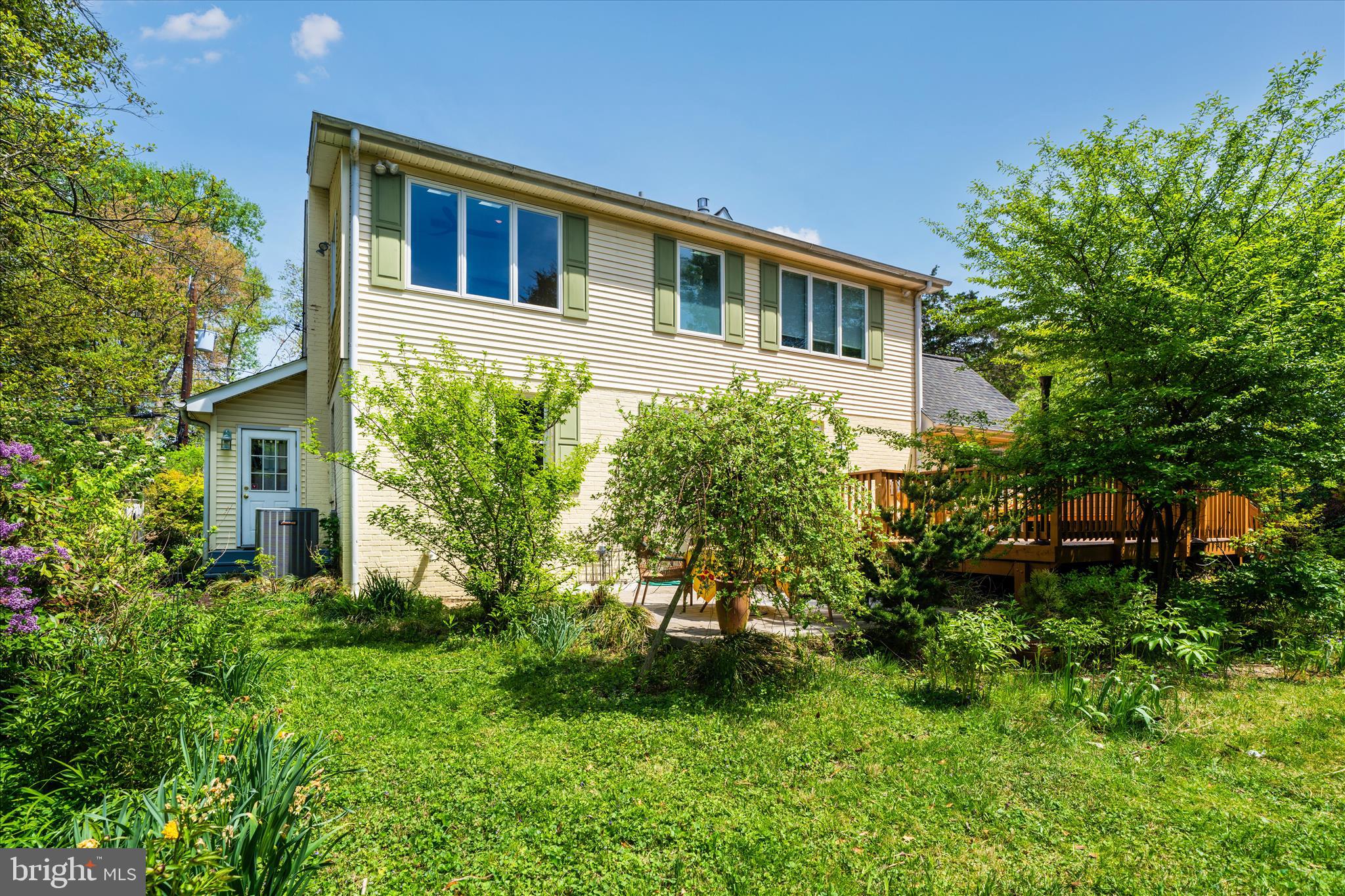 9300 Mintwood Street Silver Spring, MD 20901 - Photo 52 of 115 a front view of a house with a yard