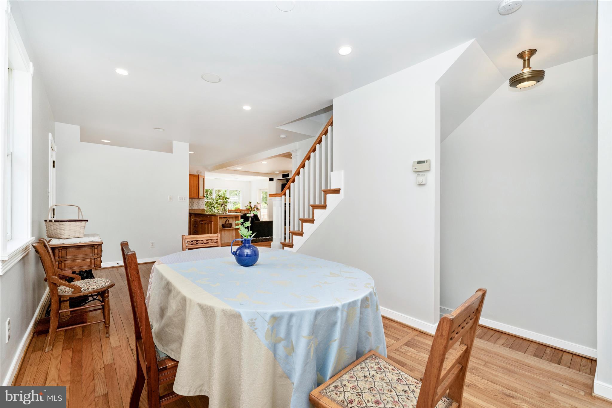 9300 Mintwood Street Silver Spring, MD 20901 - Photo 6 of 115 a view of a dining room with furniture and wooden floor