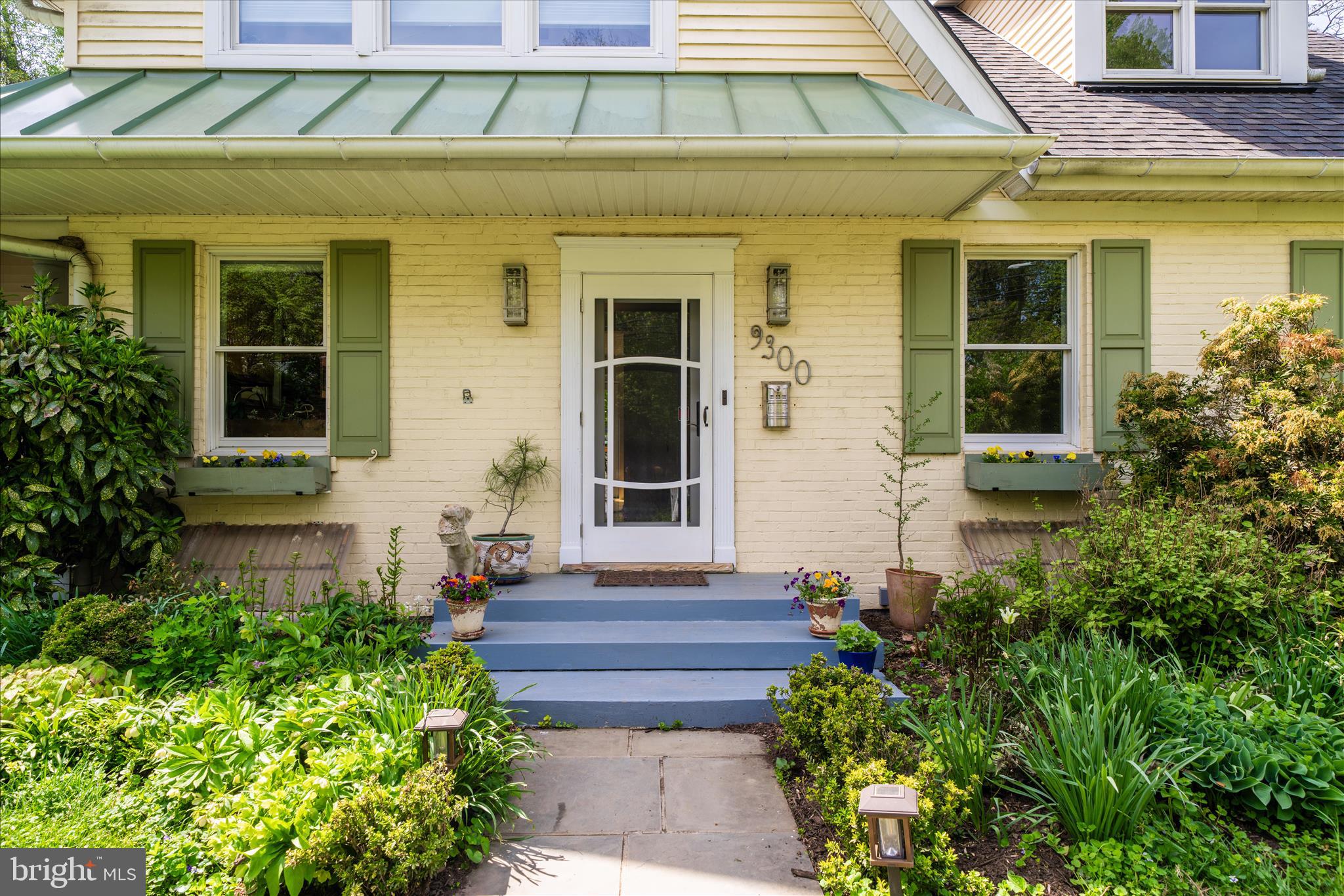9300 Mintwood Street Silver Spring, MD 20901 - Photo 65 of 115 a front view of a house with a garden