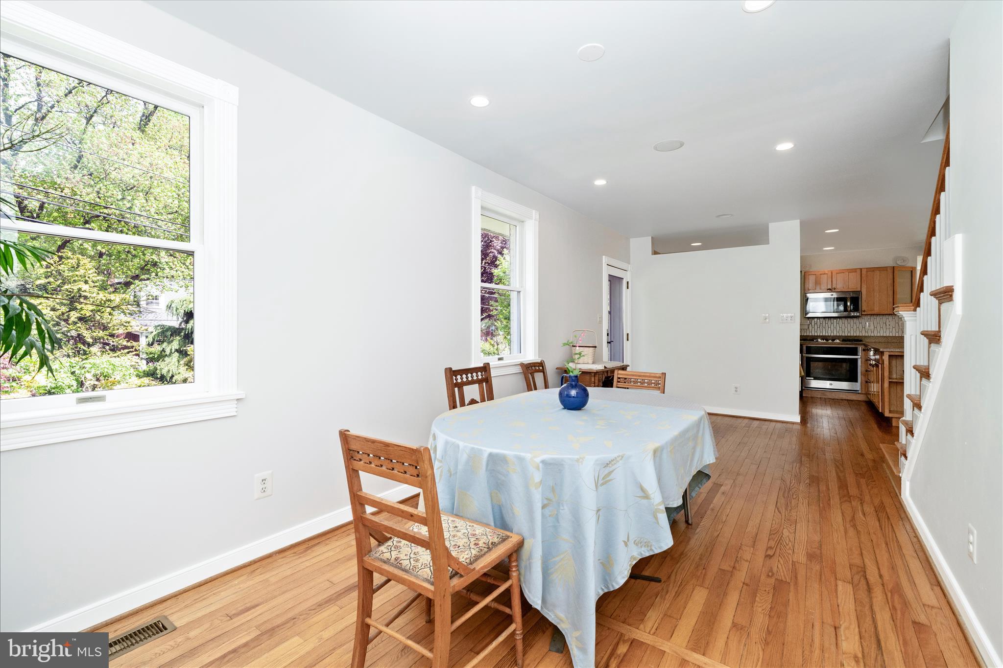 9300 Mintwood Street Silver Spring, MD 20901 - Photo 7 of 115 a view of a dining room with furniture and wooden floor