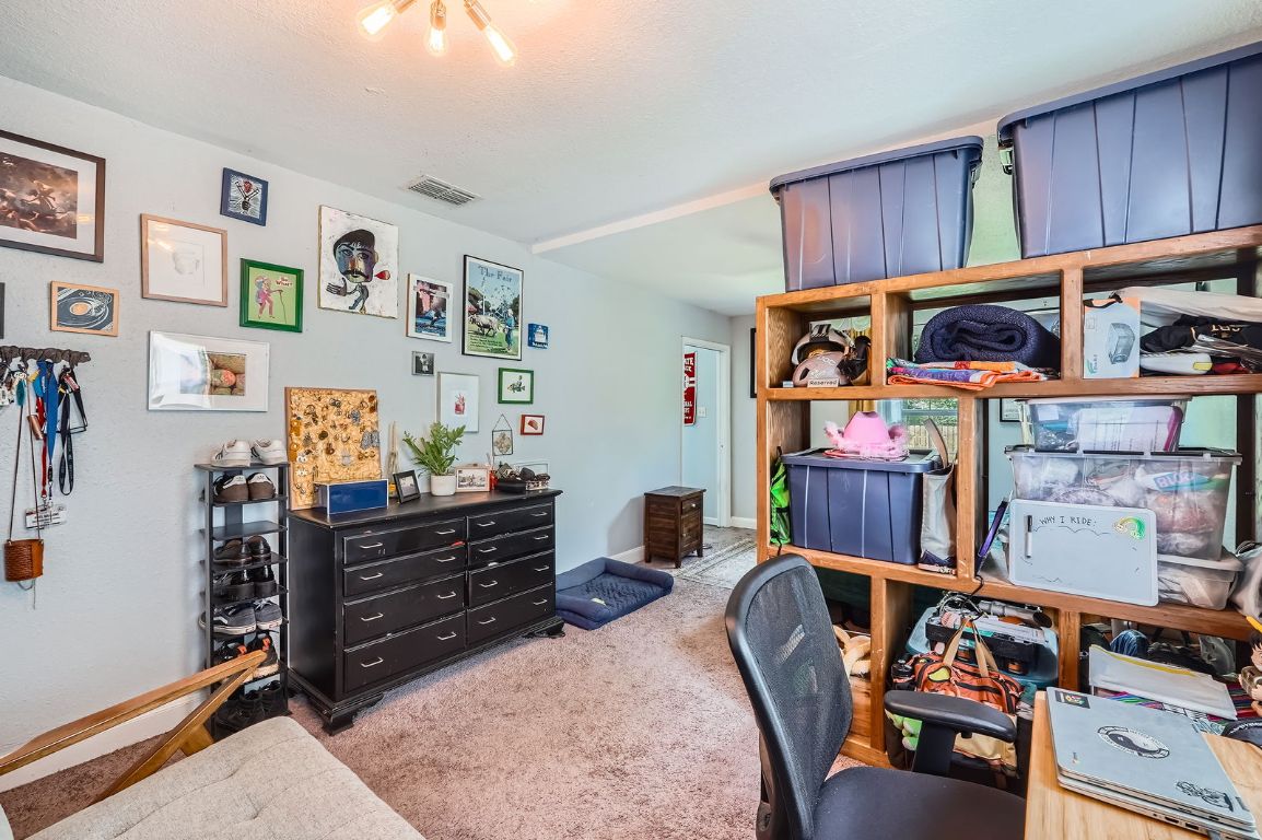 5605 Tura Lane Austin, TX 78721 - Photo 5 of 11 Office space with light carpet and baseboards