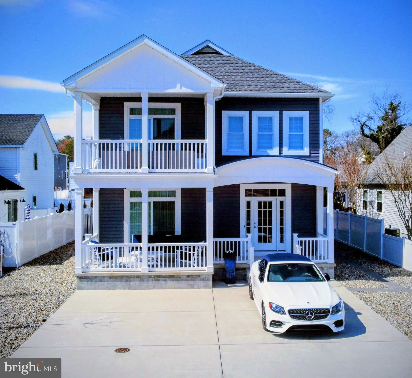 a car parked in front of a house